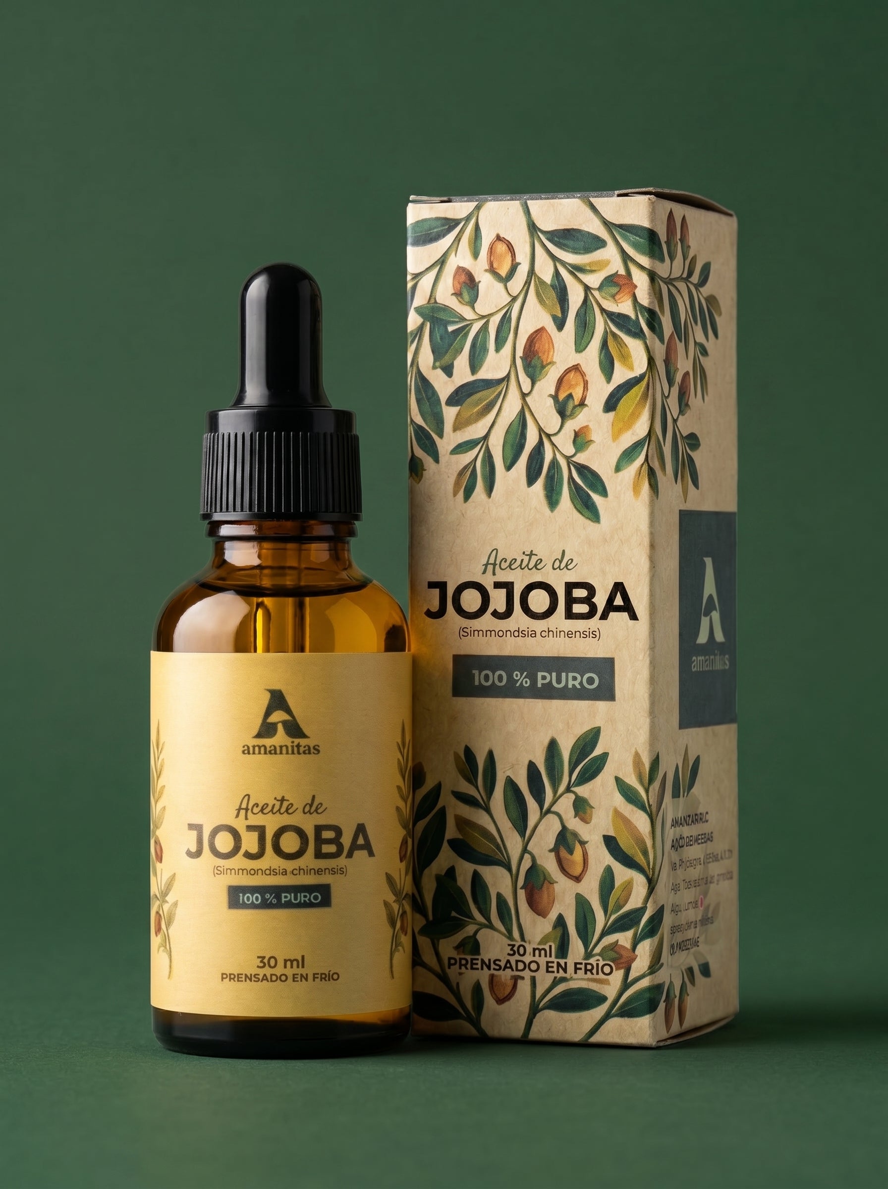 Aceite de Jojoba Amanitas 100% puro en frasco gotero de 30 ml junto a su empaque con diseño botánico. Producto cosmético natural premium, obtenido mediante prensado en frío, ideal para hidratación facial y cuidado capilar